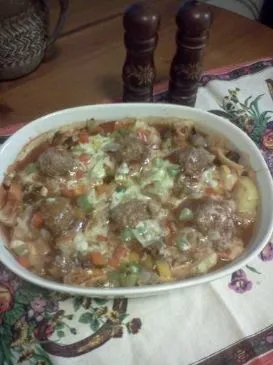 Gefüllte Champignons mit fleischlosen Bällchen und Artischocken