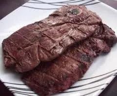 Reh-, Elch- und Moose-Steaks - Traditionelles amerikanisches Gericht