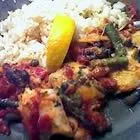 Tilapia mit Zwiebel und Tomate