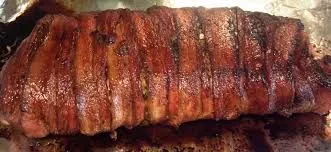 Mit Speck umwickelter Schweinelende