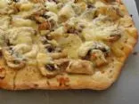 Gruyère- und Champignon-Pizza