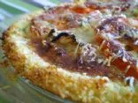 Zwiebel- und Bärlauch-Quiche mit Parmesan in einem Couscous-Boden