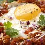 ATKINS RINDER-HUEVOS RANCHEROS AUF KANADISCHEM SPECK